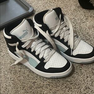 Puma High-Top Sneakers in Black, White, and Light Blue